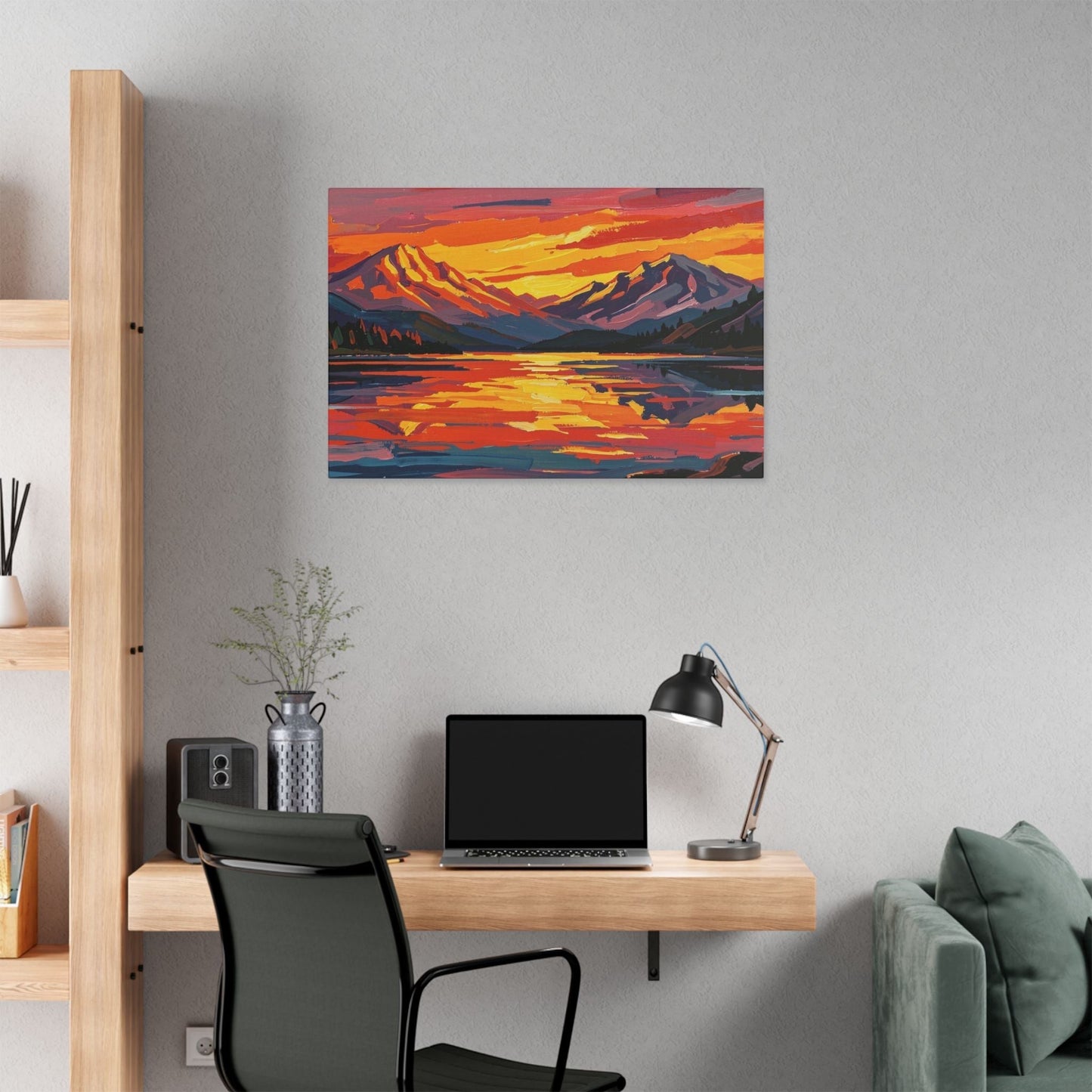 Chromatic sunset mountain lake canvas print with vibrant orange and indigo brushstrokes hanging in a modern home office.