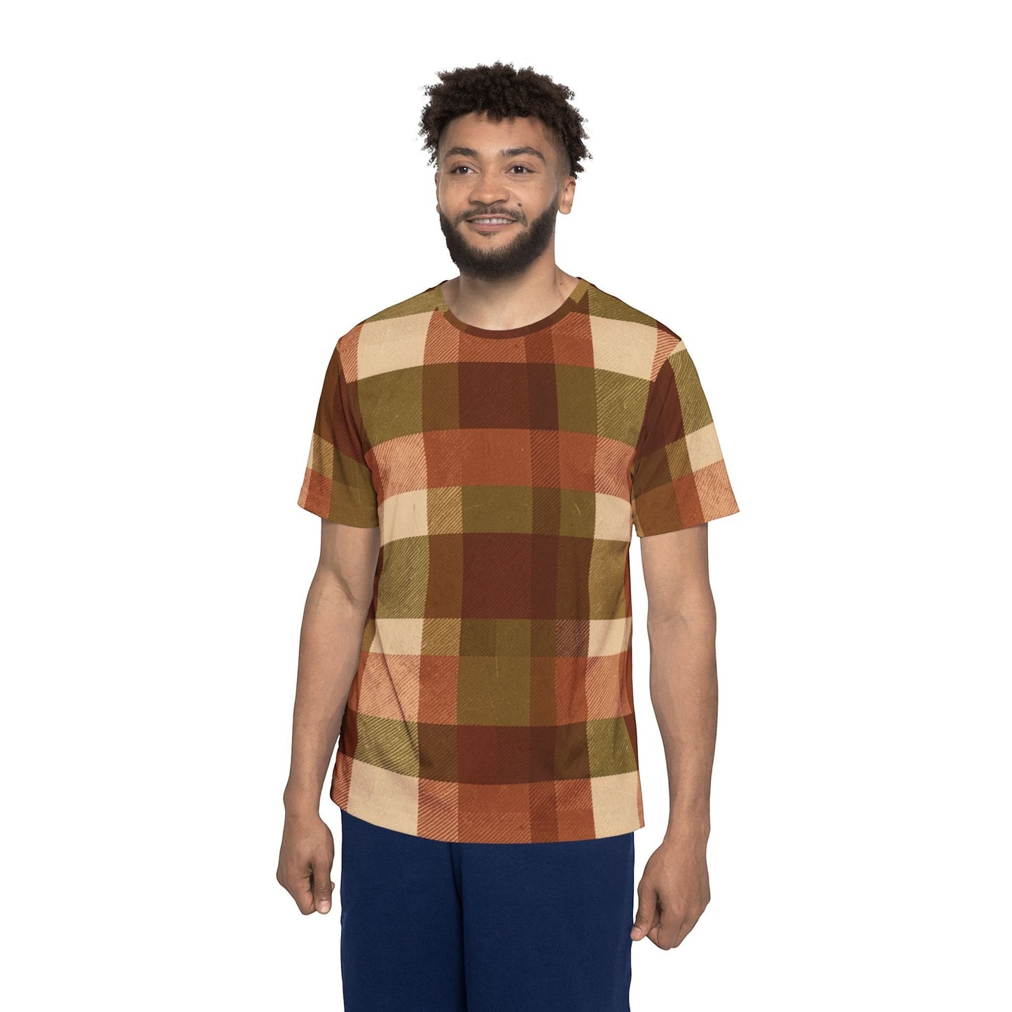 Chromatic plaid sports jersey in rust, olive, and cream on a smiling man, featuring moisture-wicking polyester.