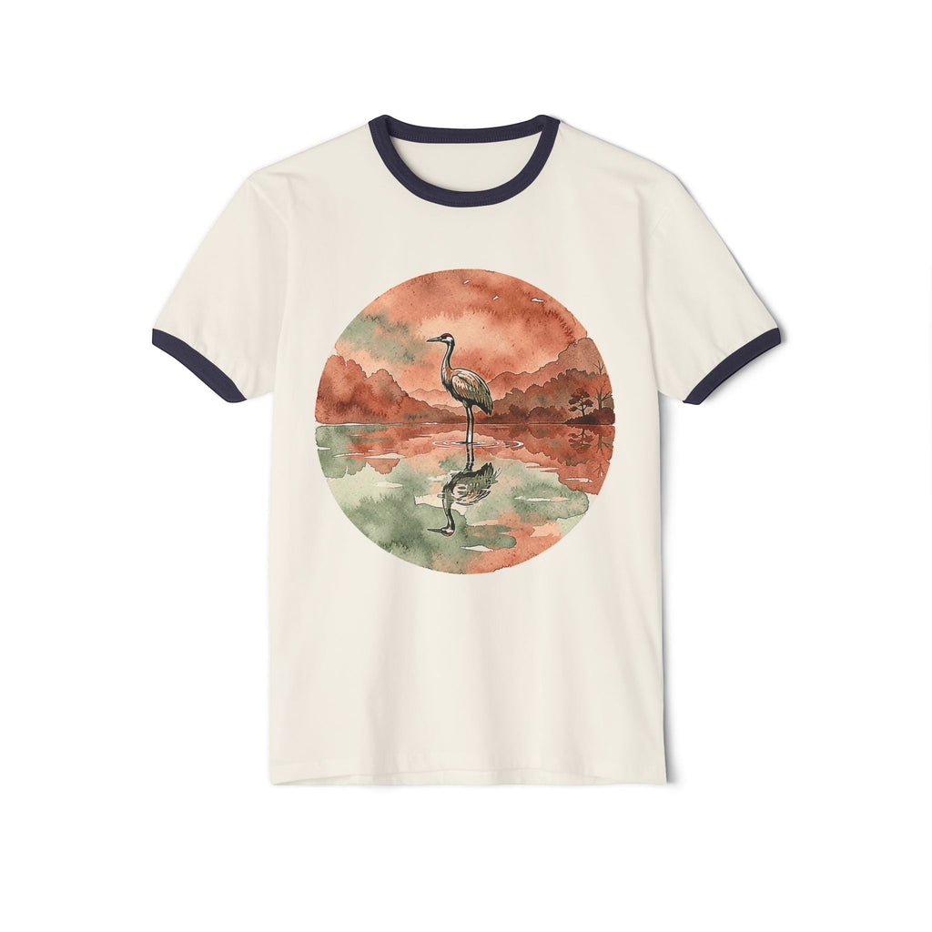 Chromatic retro ringer tee in off-white cotton with a watercolor crane and pond graphic in muted earth tones.